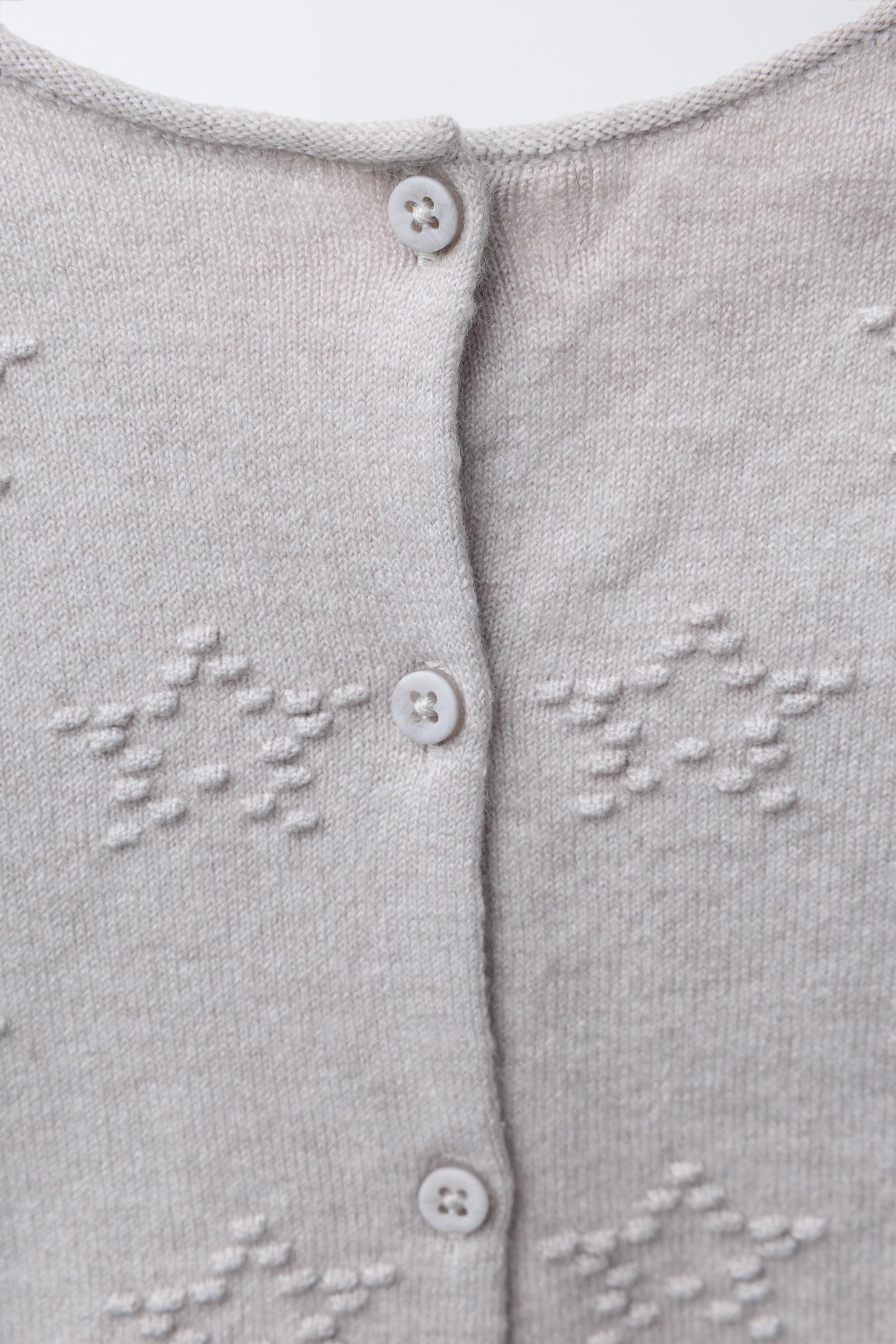 LONG KNIT JUMPSUIT WITH EMBROIDERED STARS